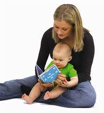 Mom reading to baby