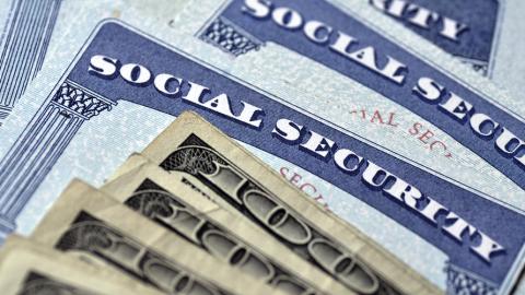 Social Security cards and money