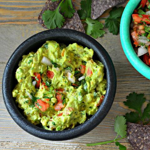 A photo of a bowl of guacamole.