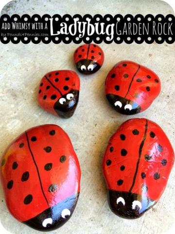 A photo of rocks painted to look like ladybugs.