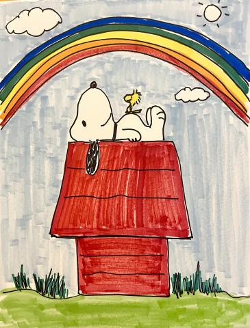 Snoopy on his red doghouse