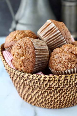 A photo of a basket of churro muffins.