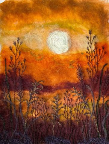 A sunset scene created using dry felting.