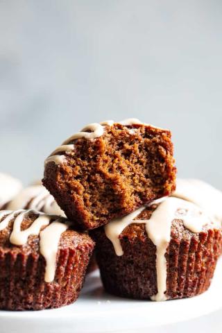 A color photo of three gingerbread muffins.