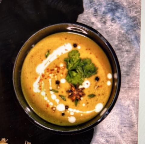 A color photo of a bowl of squash stew.