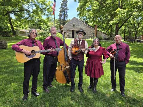 A photo of Buddy Merriam and his Back Roads band.