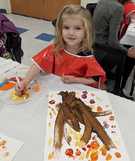 Little girl painting