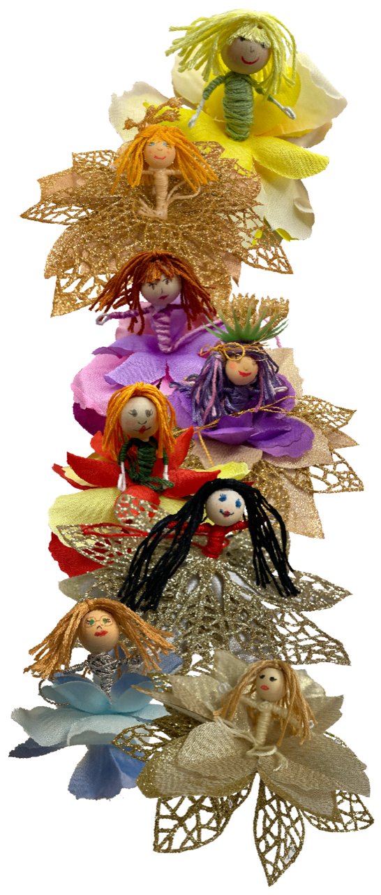 A color photo of fairy dolls made from yarn and other materials.