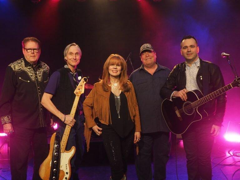 A photo of The Rustlers band.