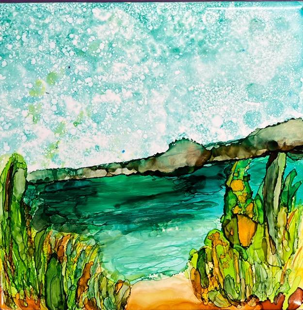 A landscape painted on a tile.
